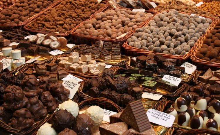 Artisan chocolate display with hand-labelled pralines and truffles at EuroChocolate Perugia